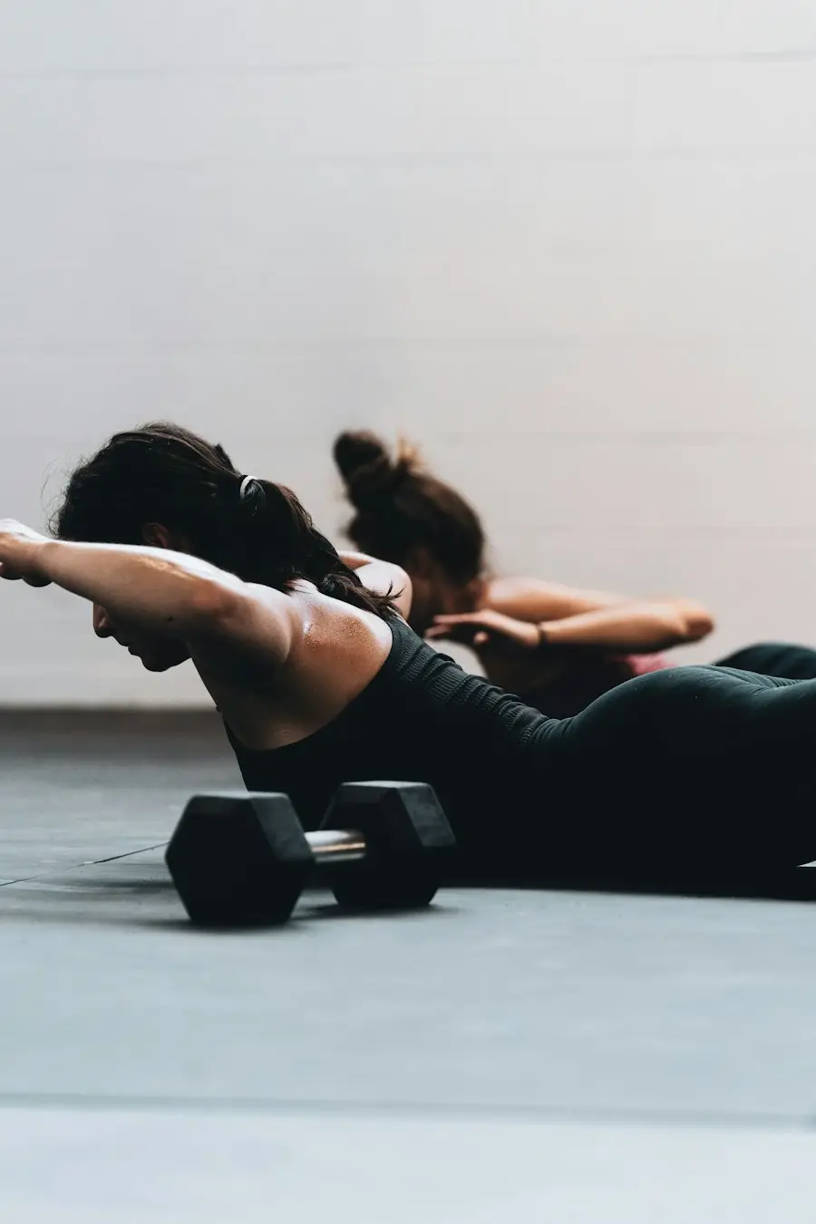 Floor exercise with dumbbells