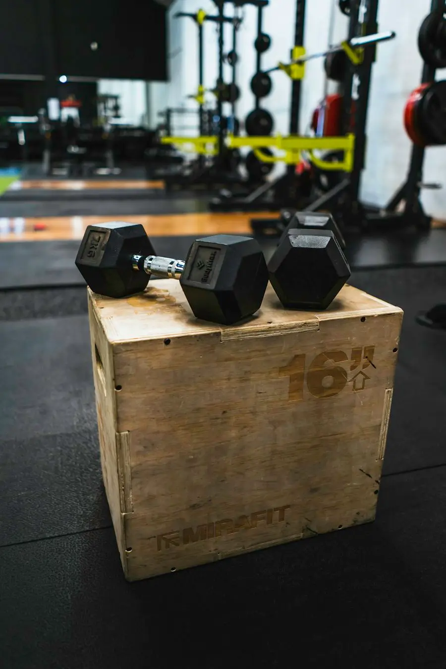 Dumbbells on a plyo box