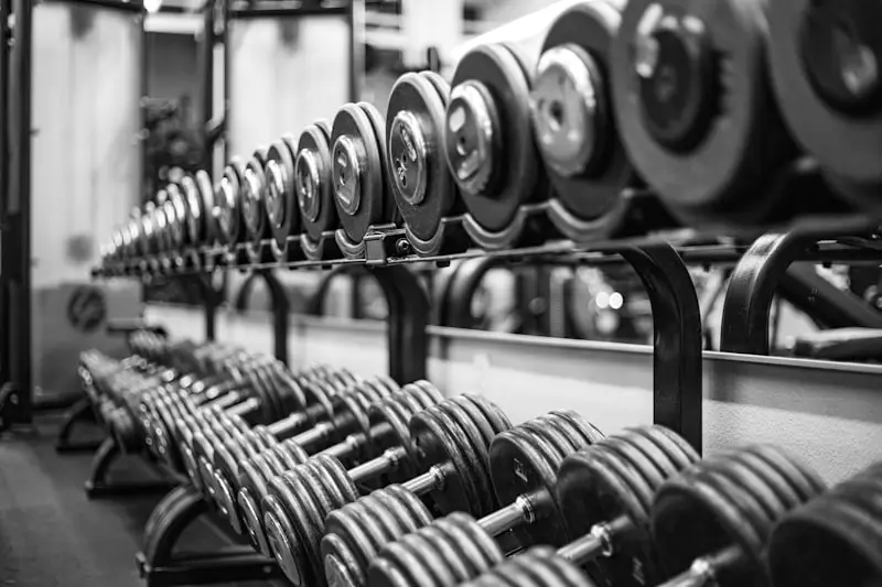 Dumbbell racks on a commercial gym floor